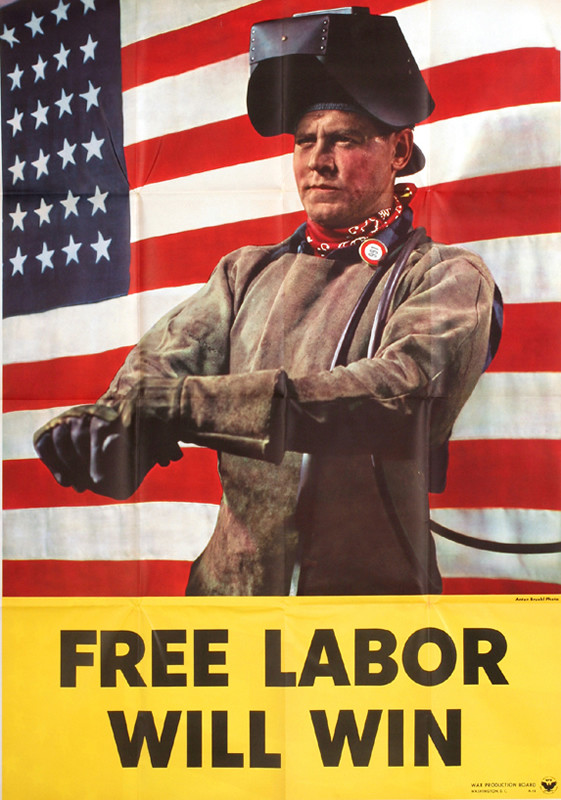 Welder in leather with hood and gloves against American flag; yellow, red, blue
