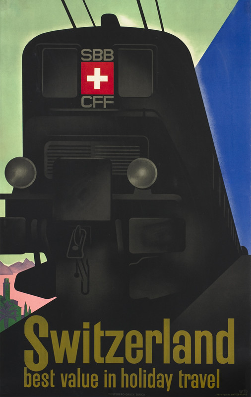 Foreshortened view of train in mountains; black; green, blue