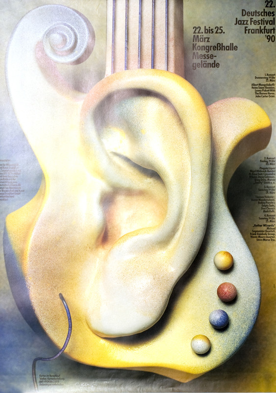 Guitar in shape of ear; blue, gray, yellow, pink