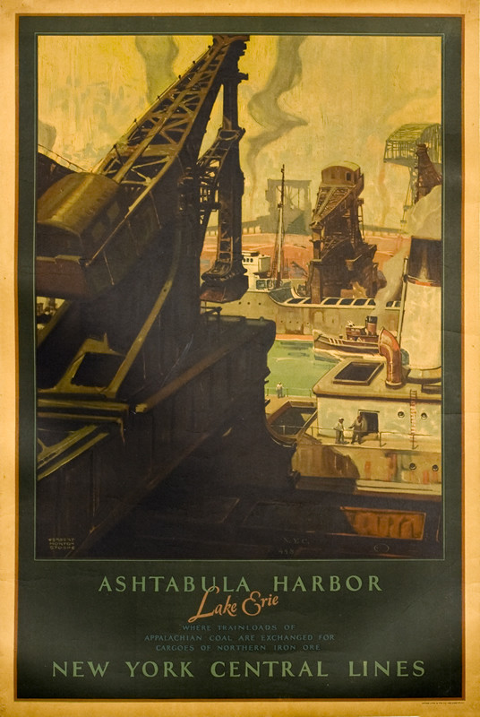 View alongside crane into bustling industrial harbor; green, yellow, brown