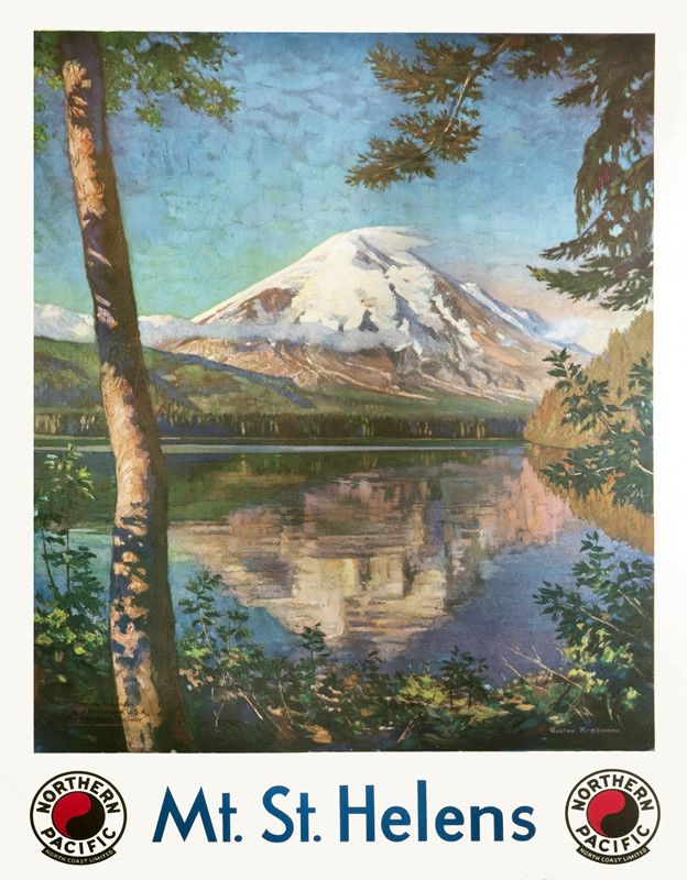 Mountain peak behind dlake and forest; green, blue