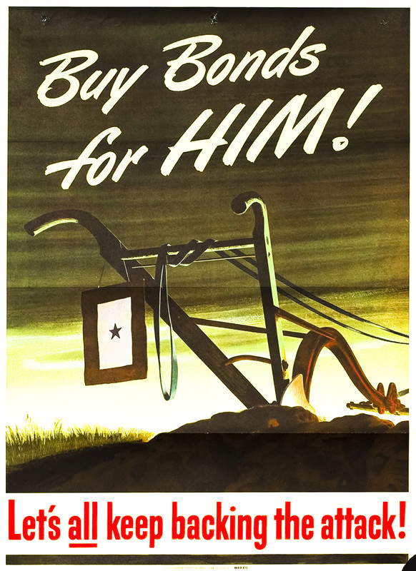 Plow with window banner hanging; green, black, yellow