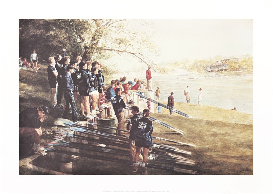 Yale crew team stands on shore of river near boats; blue, brown, gray