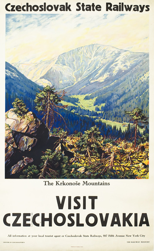 View of Krkonose mountains, rocky outcrop, forests; green, brown, blue