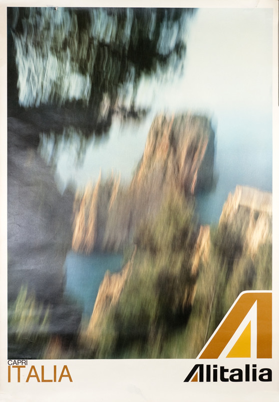 Blurry photo view of Capri; white, brown, blue