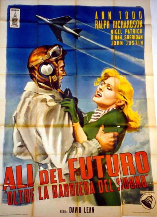 Pilot grabs blonde as plane zooms overhead; red, blue, green, yellow, white