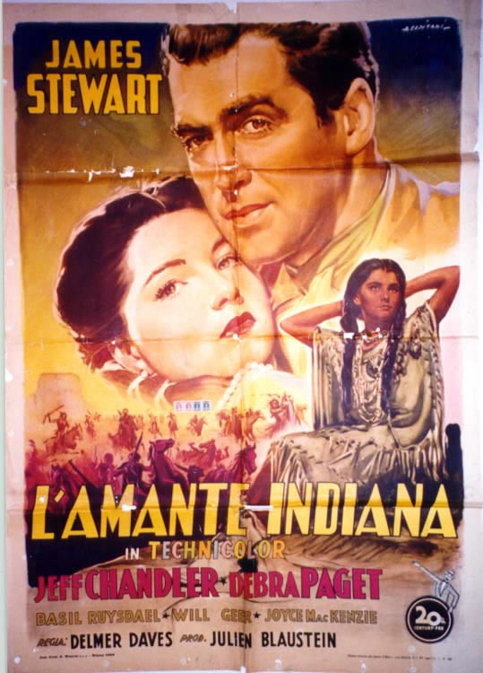 Cowboys & indians battle under portrait of Jimmy Stewart & Paget
