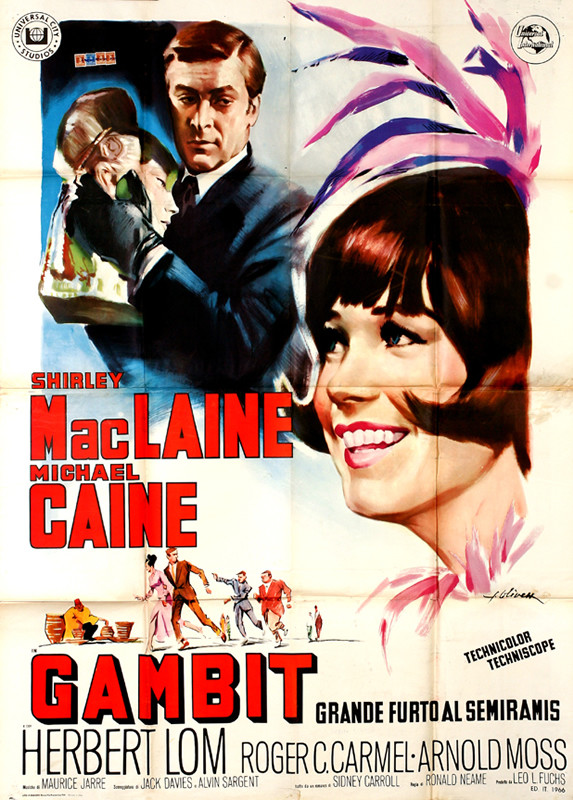 Michael Caine steals statue as Shirley MacLaine smiles; red, blue, pink