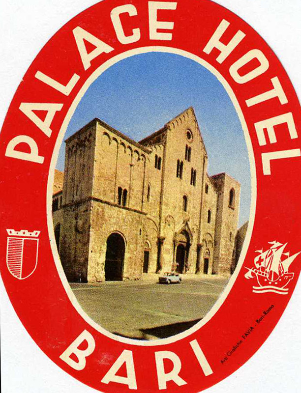 Picture of hotel encircled by "Palace Hotel" and illustration of a sailboat and crest; red, white, blue