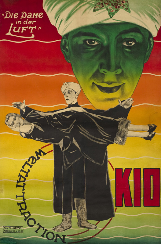 SBGW Magician levitates a woman; red, green, yellow