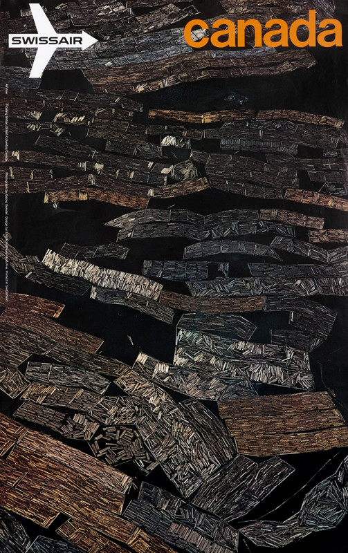 View from the air of logging operation, logs in water; brown, black, orange text