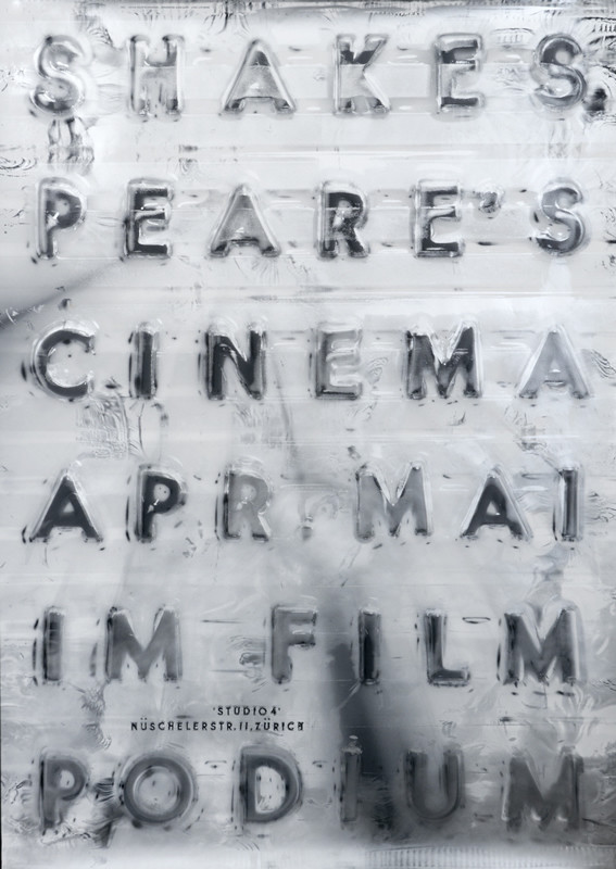 Typography on metallic background; silver, black, white