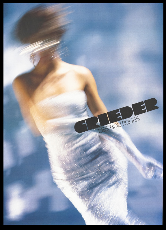 Woman in party dress in swinging dance motion; blue, white, black