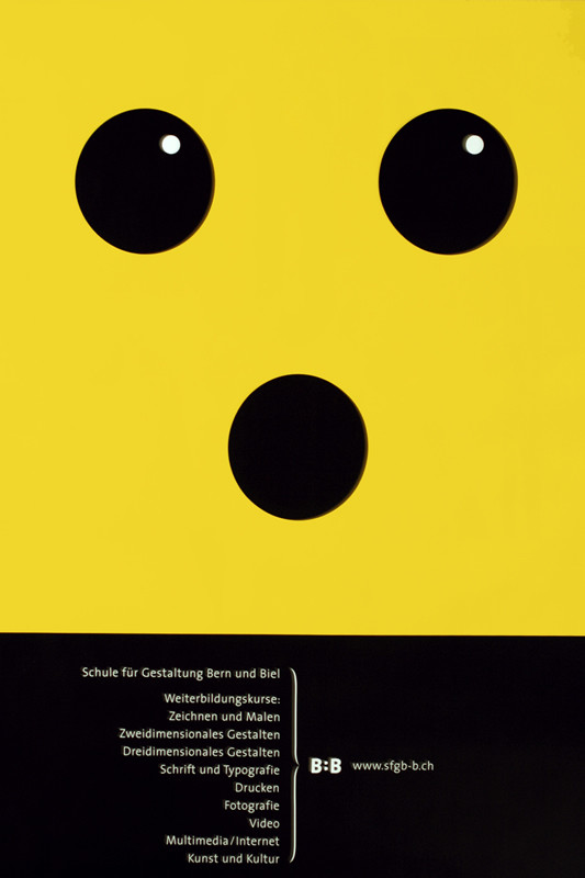 Three  black circles; yellow and black
