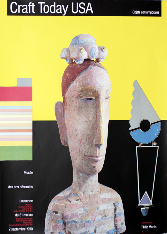 Bust with car on head, objects; yellow