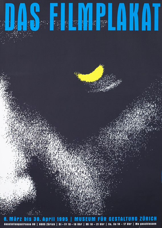 Close-up partial view of man's face with fierce expression; black, yellow, white, blue