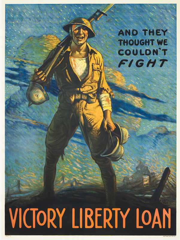 Soldier stands smiling with gun and German helmet in hands; blue, white, brown, red