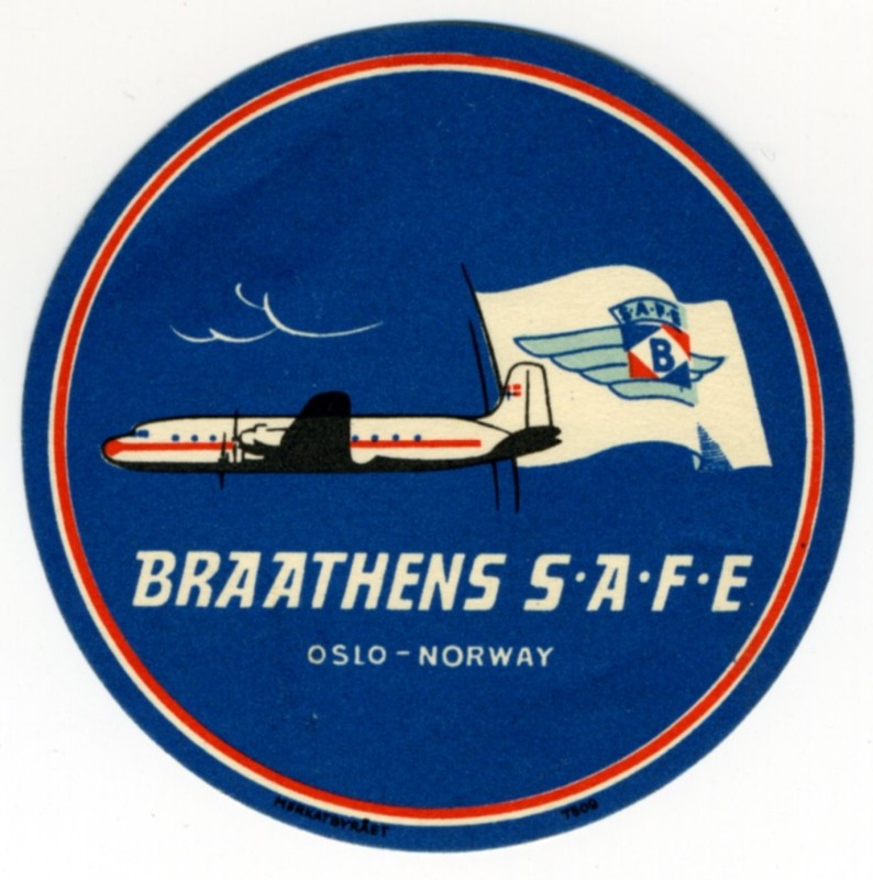 Plane flies with flag attached to fin; black, blue, red,white