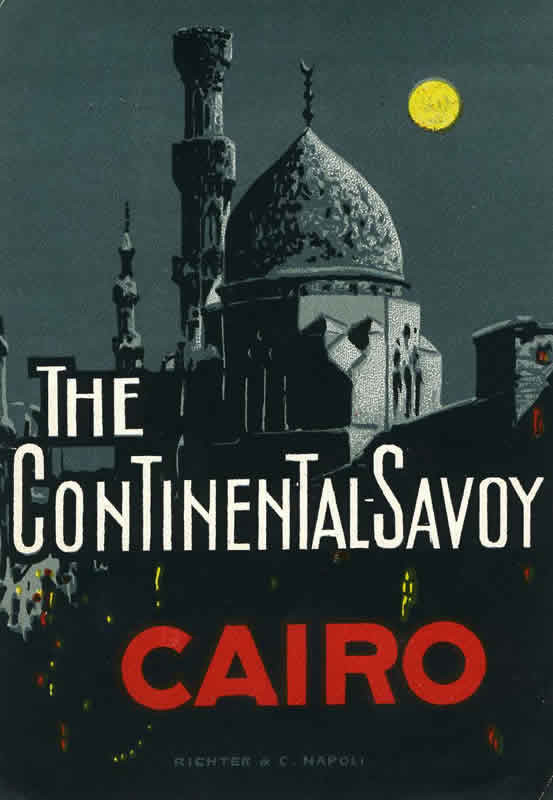 Nighttime view of Cairo hotel, skyline, full moon; gray, red, yellow