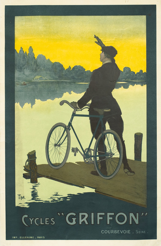 Man on dock with bicycle waves across the lake; green, blue, yellow