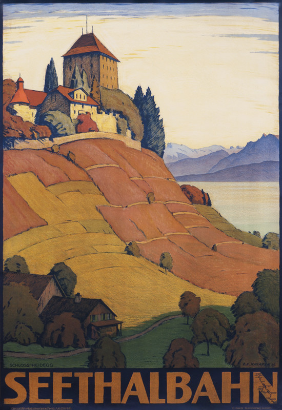 view of castle on hill and fields; green, orange, yellow
