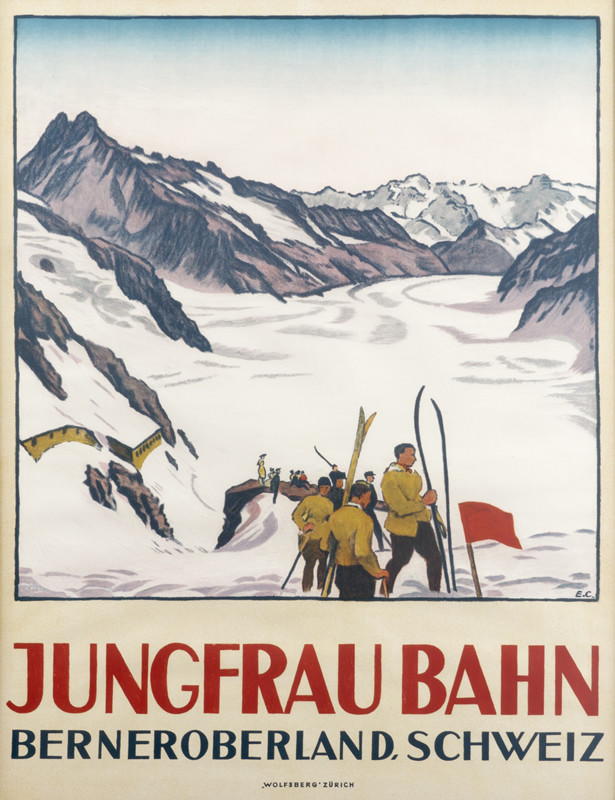 Skiiers in mountain valley in Alps; white, yellow, red, blue
