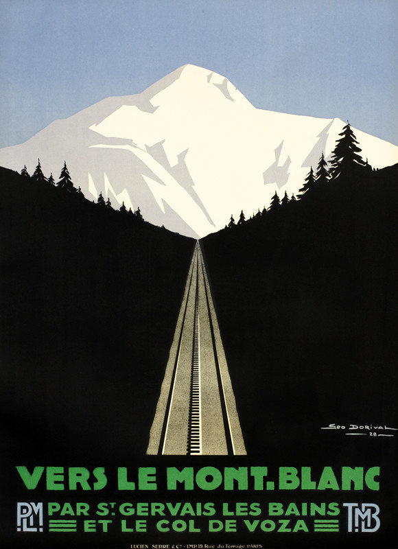 View of mountain and cog railway in daylight; green, black, blue