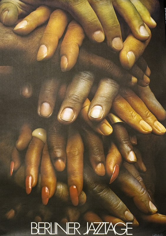 Multiple pairs of clasped hands; brown, black, beige