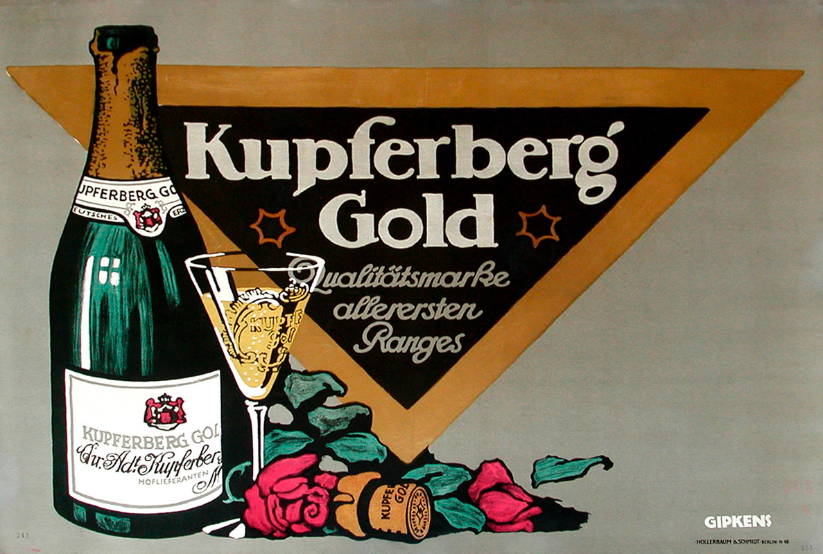 Champagne bottle, glass, and roses with gold triangle; gold, yellow, black
