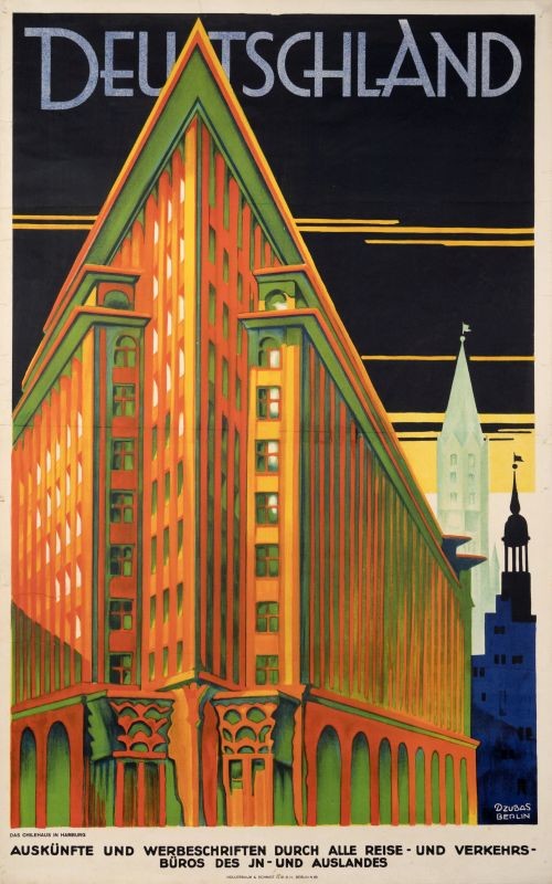 Corner of Chilehaus under darkening sky; orange, green, black