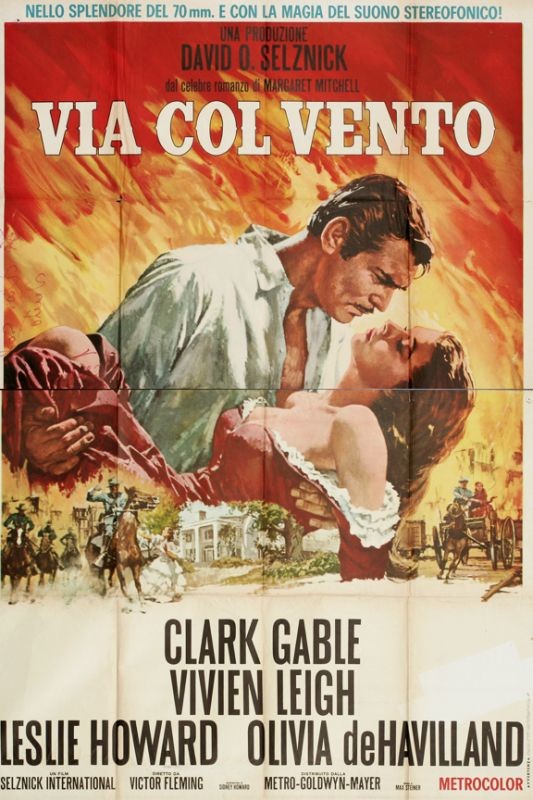 Vivian Leigh and Clark Gable embrace as Atlanta burns; red, blue, black